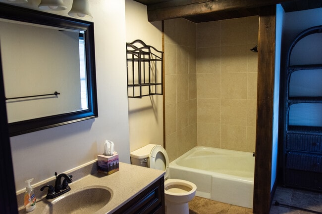 This downstairs bathroom is very spacious, with room for linen storage. - 981 Bedford St