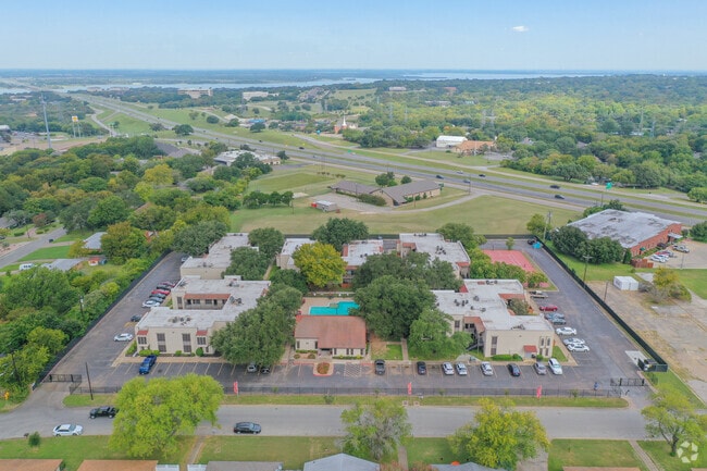 Bird’s-eye view of Madeira Apartments near shopping, dining, and medical centers. - Madeira Apartments