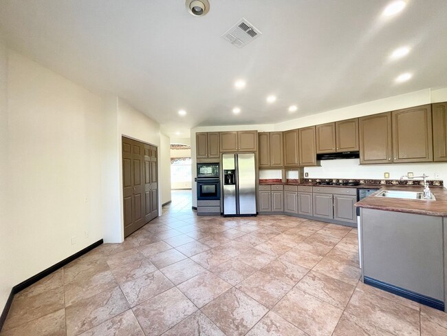 Building Photo - COMING SOON! 4 Bedroom 3 Bathroom PALM DES...