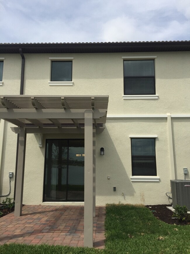 Photo - Water View - The Vistas at Champions Gate ... Townhome