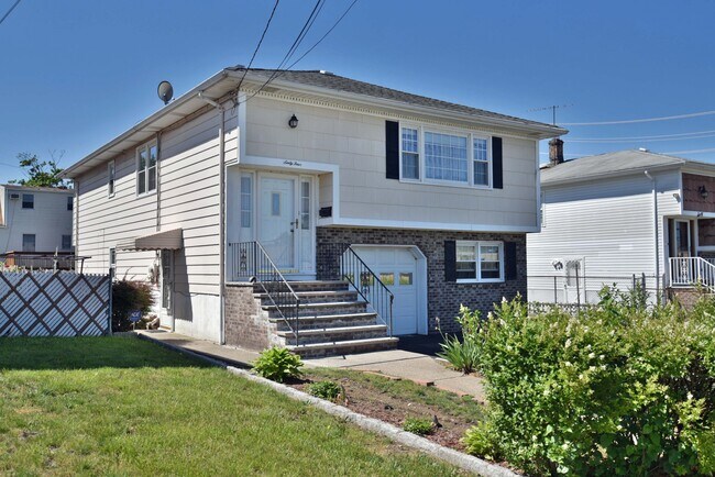 Front of House with private entrance on side - 64 Gilbert Ave