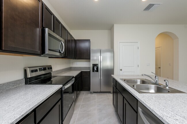 Foto del edificio - 2963 Suncoast Plains Dr
