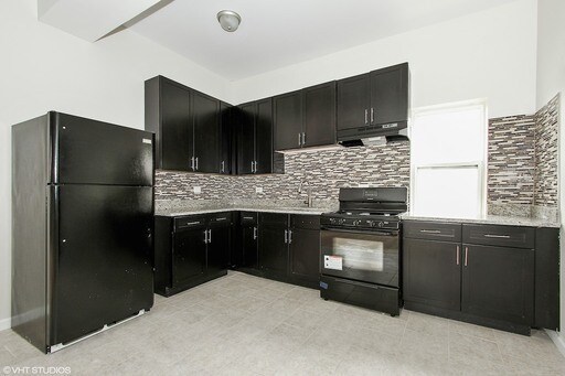 Building Photo - 6359 S Rhodes Ave