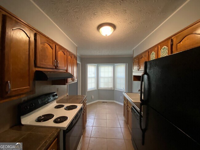 Building Photo - 7155 Williamsburg Dr