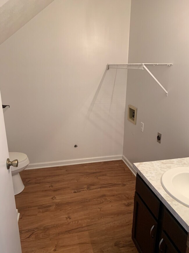 1/2 Bath with Laundry - 303 Remington Ct