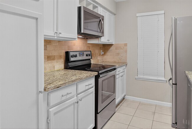 Foto del edificio - 10555 Turtlewood Ct