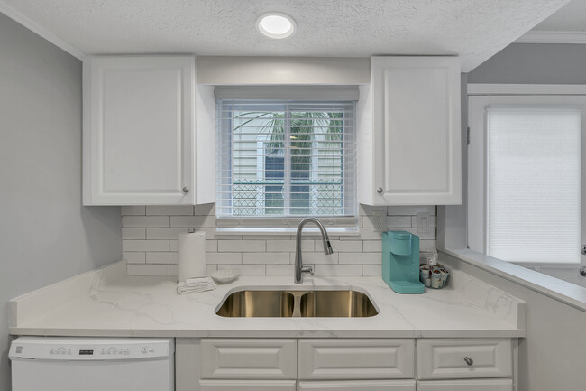 Kitchen sink with window - 7904 Surf Dr