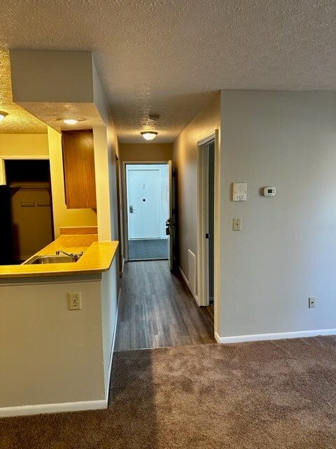 Hallway in 2229 A- on right is the primary bedroom - 2229 Hedgerow Rd