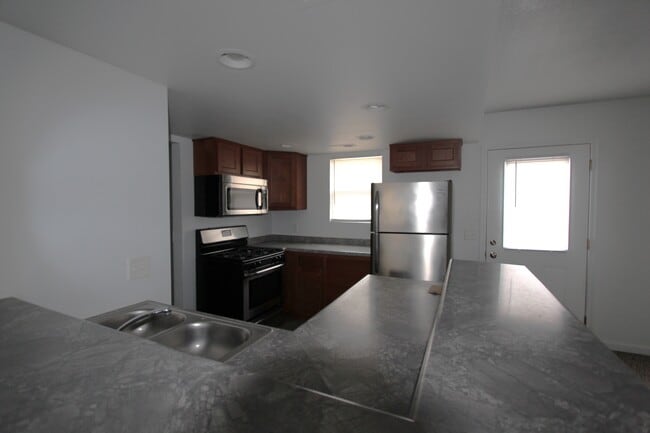 Kitchen - Candlelight Apartments & Condos