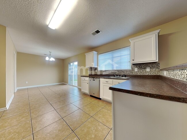 Building Photo - 10098 Chariden Dr