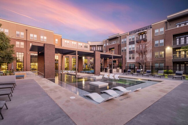 Resort-style Swimming Pool with Tanning Ledges - Bexley on Main