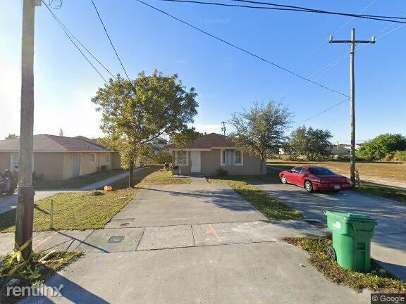 Foto principal - 4 br, 2 bath House - 7601 NW 20th Ave Exce...