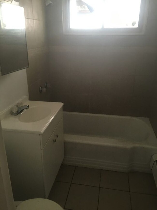 Building Photo - 11017 S Vernon Ave