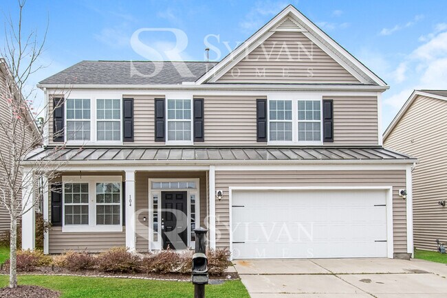 Building Photo - Feel welcome in this well-maintained 4BR 2...