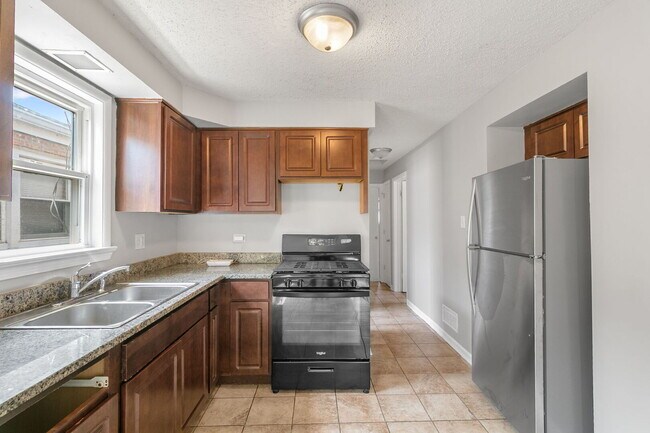 Foto del edificio - 7216 S Central Park Ave