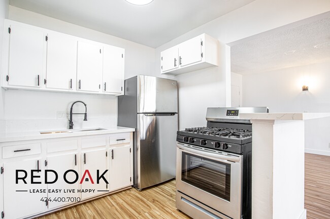 Building Photo - Spacious, Bright and Completely Remodeled ...