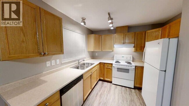 Photo du bâtiment - 13025-13095 95 St