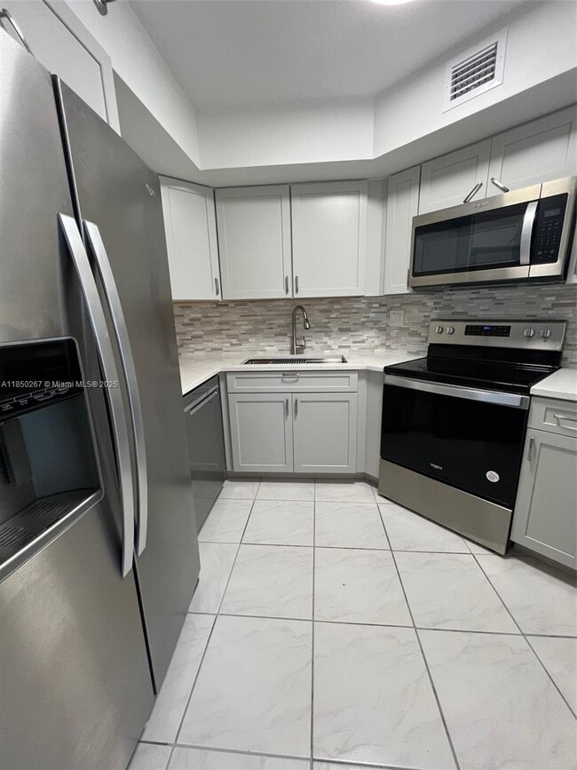 Building Photo - 6767 Collins Ave