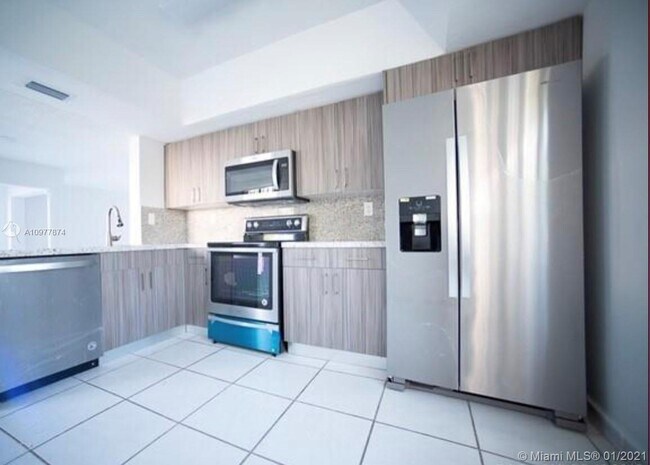 Building Photo - 1401 SW 124th Ct