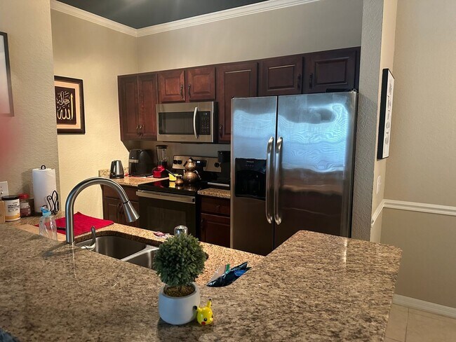 Building Photo - Charming 2BR Townhome in Millenia Orlando