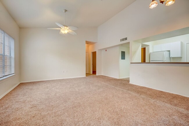Building Photo - Two bedroom on 2nd floor condo in gated ne...