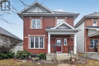 Building Photo - 1448 Queensdale Ave