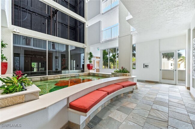 Building Photo - 6361 Pelican Bay Blvd