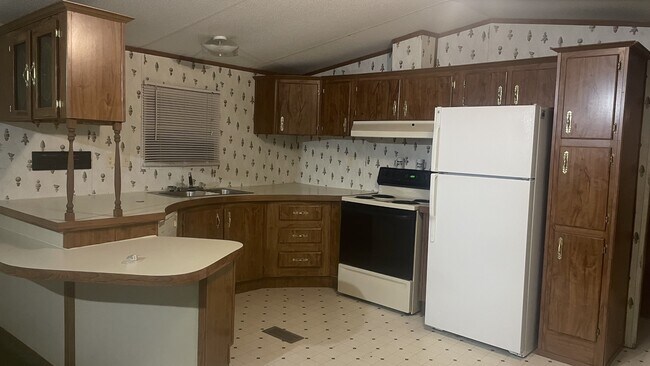 Foto del edificio - 1518 Lee County Rd 270