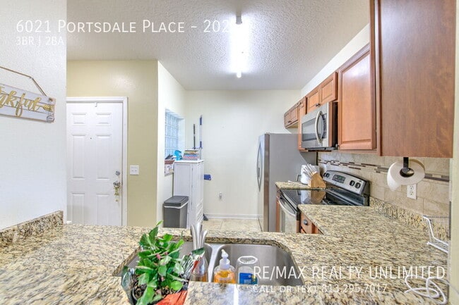 Building Photo - 6021 Portsdale Pl