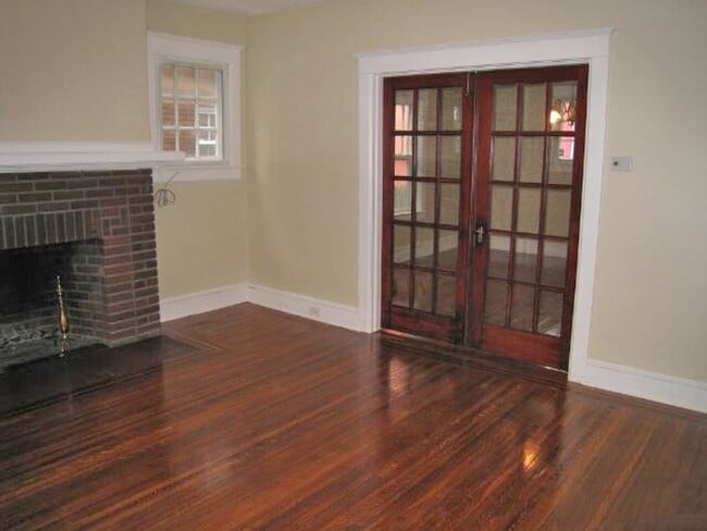 Building Photo - 4BR Home with Natural Light, Covered Porches & Bonus Sunroom