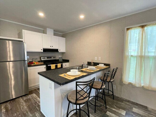 Foto del edificio - 8880 Turkey Ridge Rd