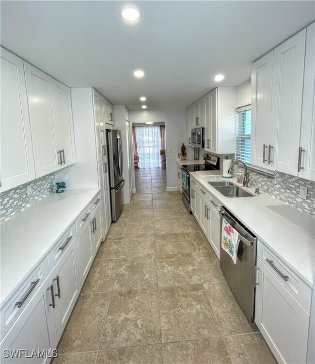 Building Photo - 6371 Pelican Bay Blvd
