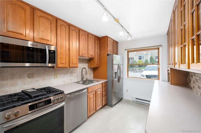 Foto del edificio - 14 Brewster Woods Dr
