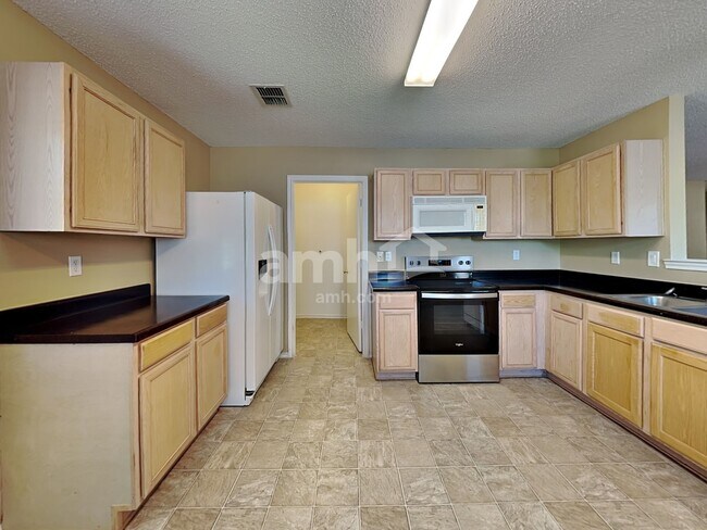 Foto del edificio - 1100 Willow Tree Dr