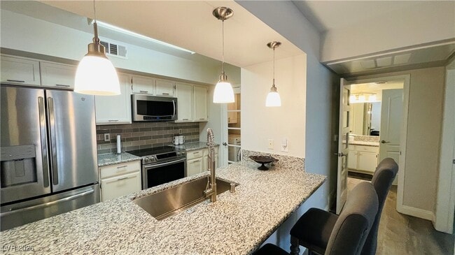 Building Photo - 6650 W Warm Springs Rd