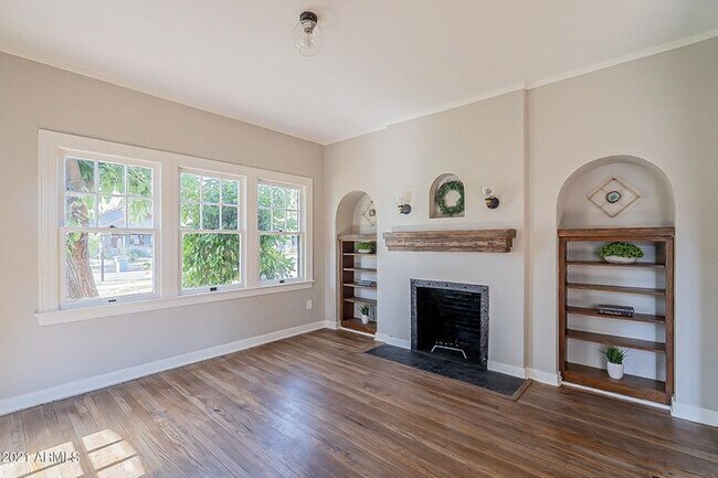 Living Room with a view of the large mature trees - 93 W Willetta St