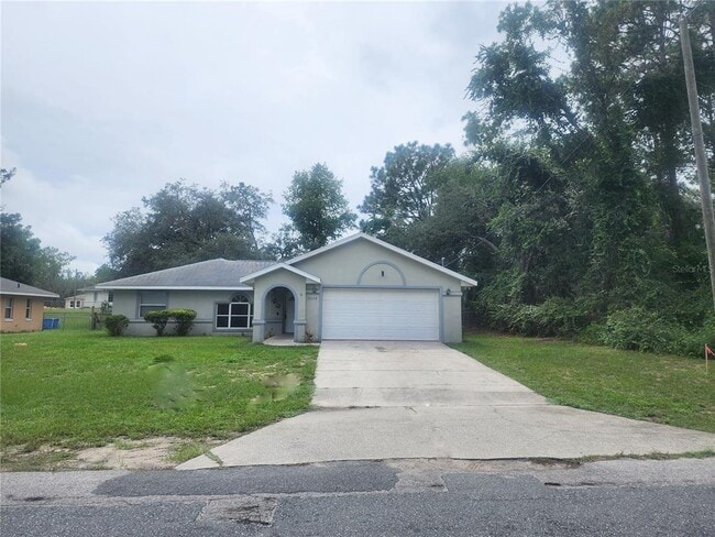 Building Photo - 9392 N Sandree Dr