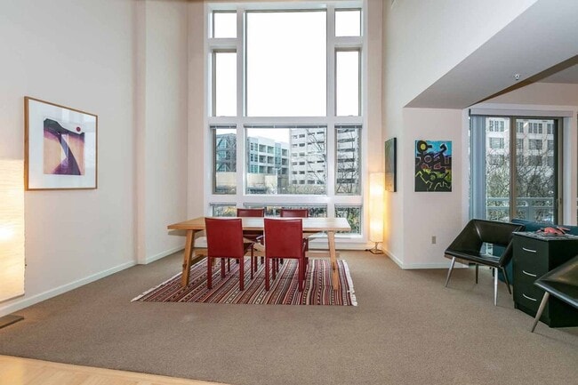 Building Photo - Gorgeous loft-style 2 floor condo with secured parking, A/C and rent includes most utilities!