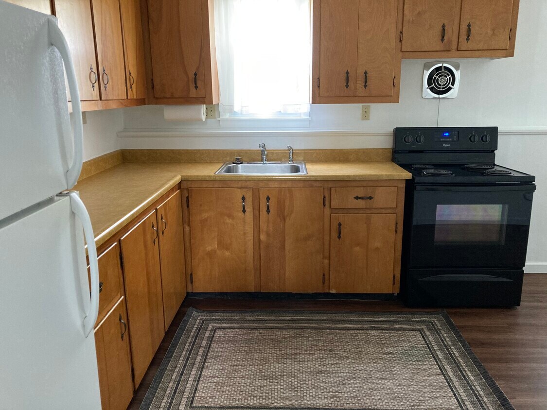 Unit includes entire bottom half of house pictured. Rental includes washer/dryer and garage . Suita - 6 Concord Ave