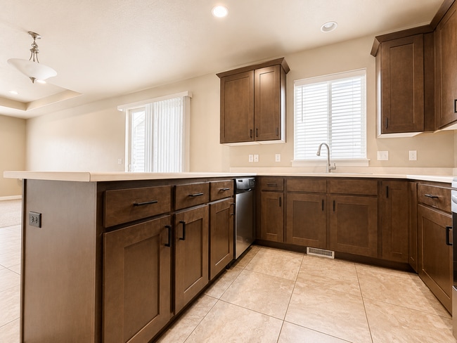 Building Photo - Beautiful 3BR Home with Fenced Yard, 2-Car Garage & Huge Storage – Prime Midvale Location!