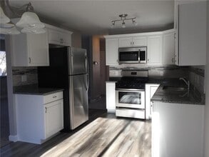 Building Photo - 4786 Grenwich Way N