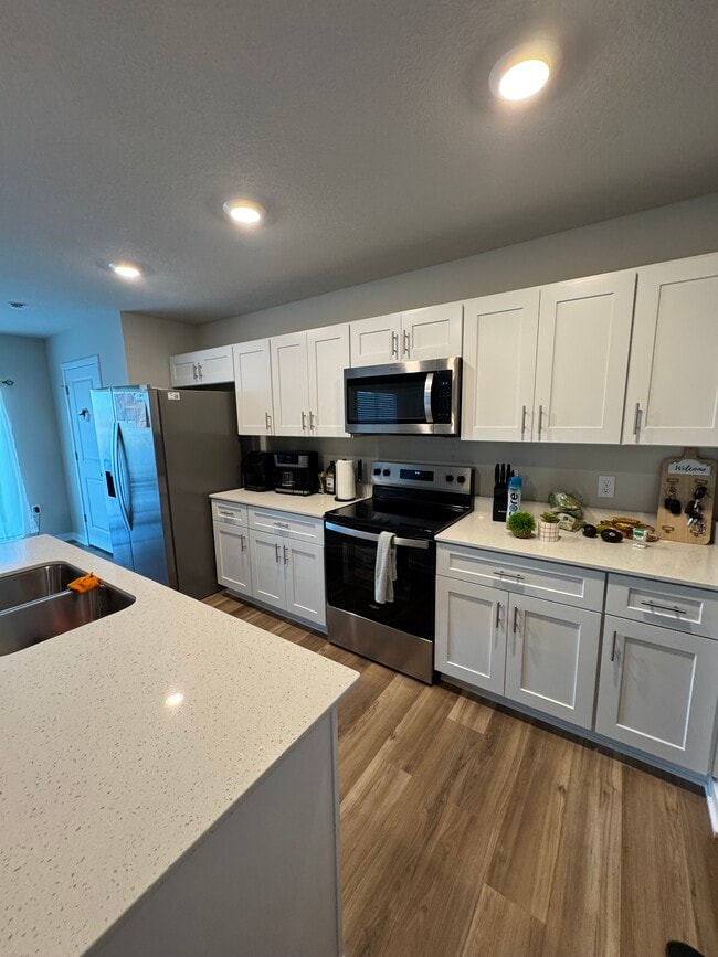 Foto del edificio - 1603 NE Crossing Oaks Ln