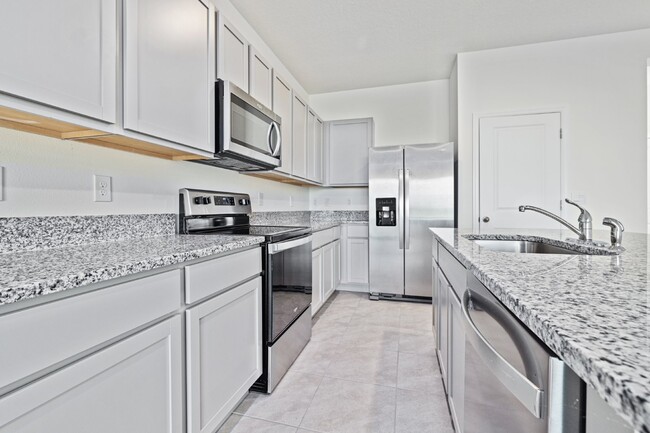 Foto del edificio - "Elegant 3-Bedroom Home with Granite Count...