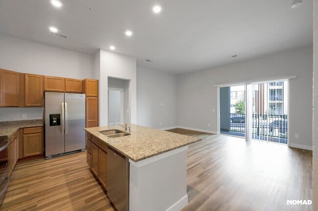 Foto del edificio - Charming 2BR-2BA Condo in Aurora Town Center