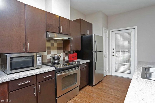 Building Photo - 1 br, 1 bath Apartment - 210 N Custer Rd