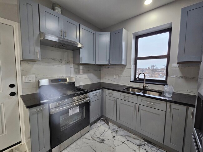 New cabinets and countertop - 4720 W Armitage Ave