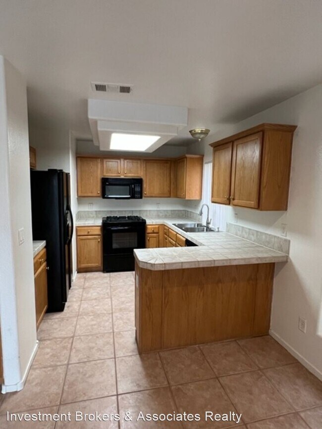 Foto del edificio - 3 br, 2.5 bath House - 7466 Mission Palm