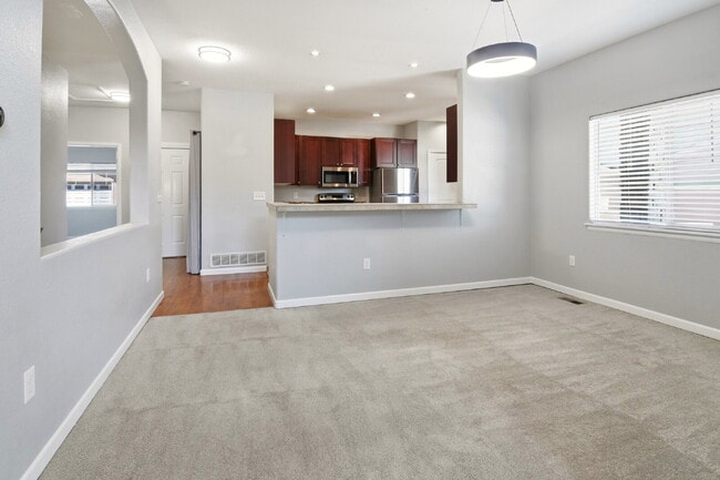 Building Photo - $2,990.95 - 4 Bed, 3 Bath Townhome In Commerce City with Central AC and In Unit Laundry!