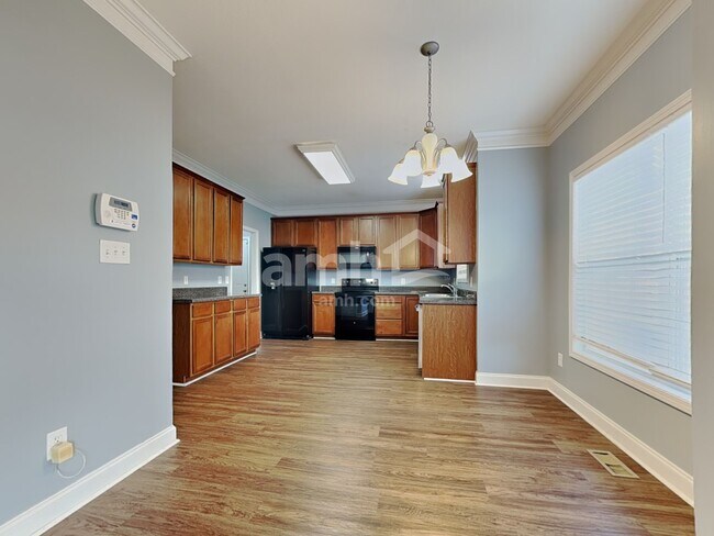 Foto del edificio - 5818 Rhyne Cove Ln