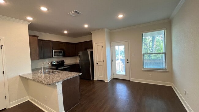 Building Photo - Don’t Miss Out on This Gorgeous Townhome! ...